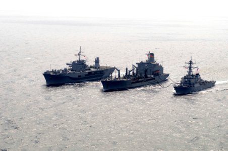 US Navy 110218-N-9094S-316 The U.S. 7th Fleet command ship USS Blue Ridge (LCC 19), left, the Military Sealift Command fleet replenishment oiler US