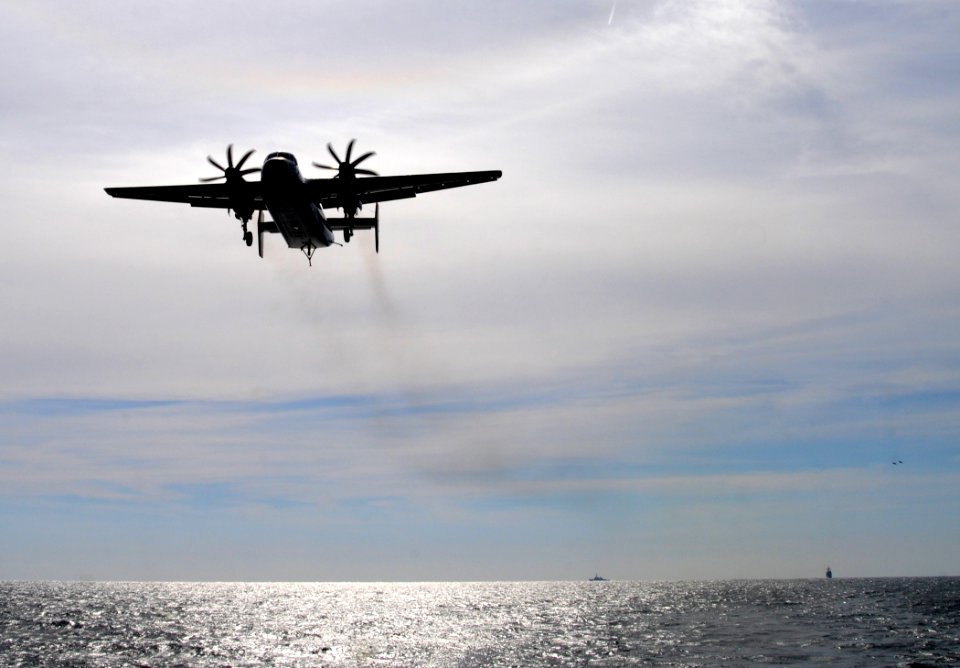 US Navy 110215-N-6632S-008 A C-2 Greyhound assigned to Fleet Logistics Support Squadron (VRC) 40 lands aboard the aircraft carrier USS George H.W