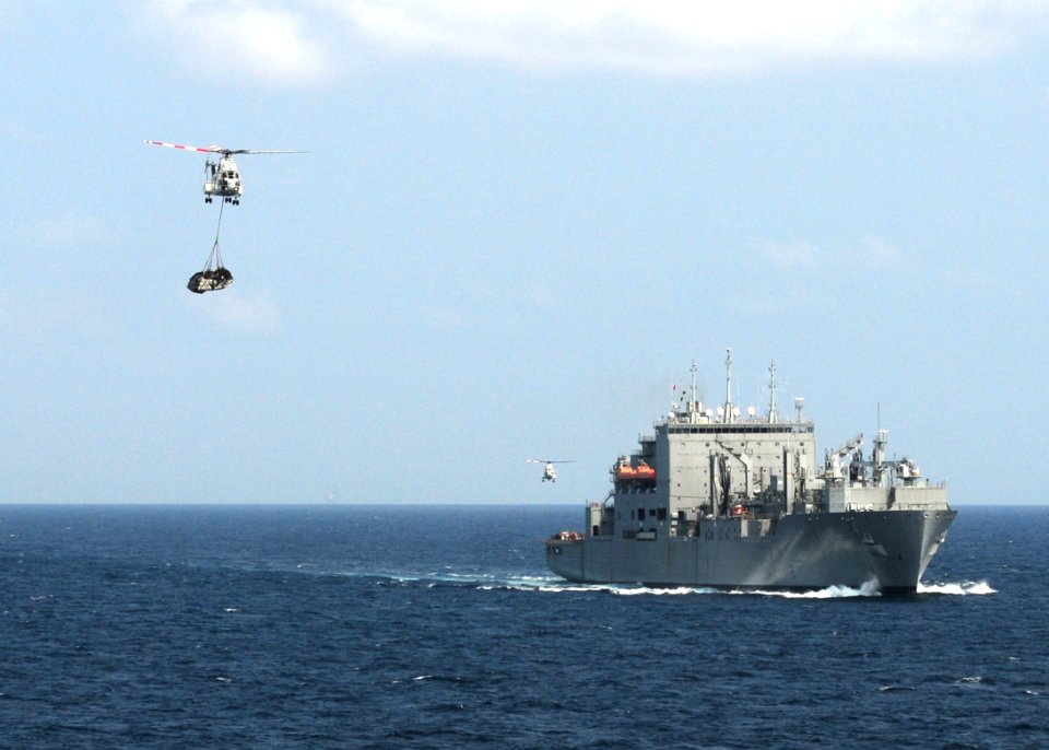 US Navy 110215-N-5538K-050 An SA-330J Puma helicopter moves cargo from the Military Sealift Command dry cargo and ammunition ship USNS Richard E. B