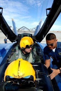 US Navy 110215-N-IR859-015 Vice Adm. Allen G. Myers, commander of U.S. Naval Air Forces, is strapped into an F-A-18 Hornet, assigned to the U.S. Na