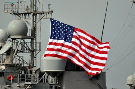 US Navy 110216-N-7293M-462 The holiday flag is raised aboard the guided-missile cruiser USS Leyte Gulf (CG 55) as the ship participates in a combin photo