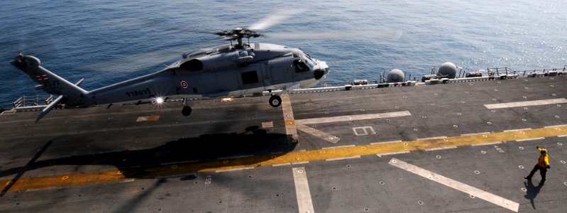 US Navy 110216-N-4743B-280 A Royal Thai Navy S-70B Sea Hawk helicopter lands aboard USS Essex (LHD 2)