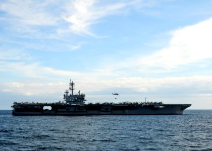 US Navy 110217-N-9793B-132 An SH-60S Sea Hawk helicopter lifts off from the aircraft carrier USS George H.W. Bush (CVN 77) during a vertical replen