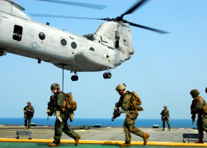 US Navy 110218-N-8607R-127 Marines assigned to the Force Reconnaissance Platoon of the 31st Marine Expeditionary Unit (31st MEU) fast rope photo