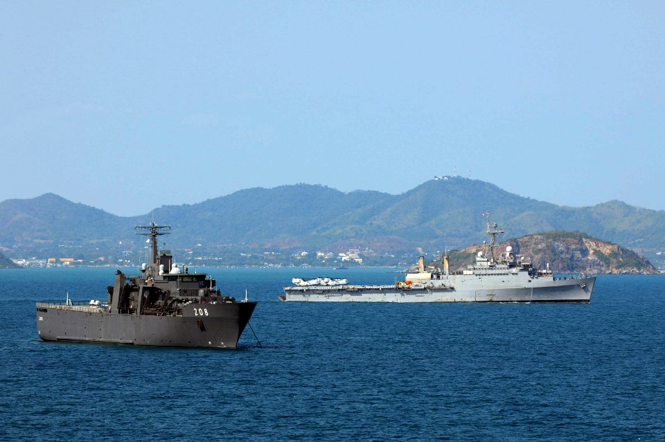 US Navy 110220-N-6692A-058 The amphibious transport dock ship USS Denver (LPD 9) passes along side the Singapore navy endurance-class amphibious tr