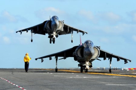 US Navy 110217-N-KD852-356 An AV-8B Harrier assigned to the Black Sheep of Marine Attack Squadron (VMA) 214, front, prepares for takeoff as another