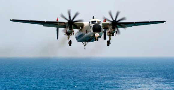 US Navy 110221-N-DR144-271 A C-2A Greyhound assigned to Fleet Logistics Support Squadron (VRC) 40 lands aboard the Nimitz-class aircraft carrier US