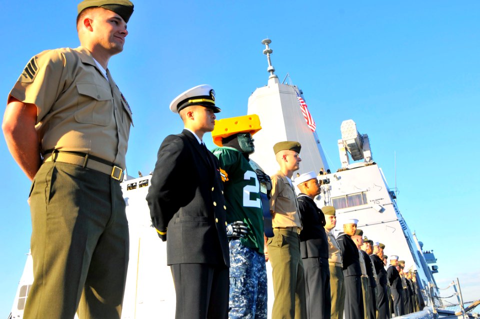 US Navy 110222-N-7042V-019 Sailors and Marines man the rails as the amphibious transport dock ship USS Green Bay (LPD 20) departs San Diego on its