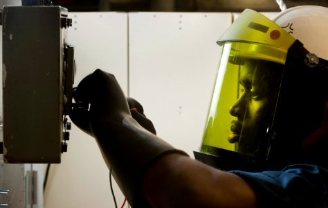 US Navy 110301-N-DR144-037 Electrician's Mate Fireman Alex Kline, assigned to the electrical division of the engineering department of the Nimitz-c
