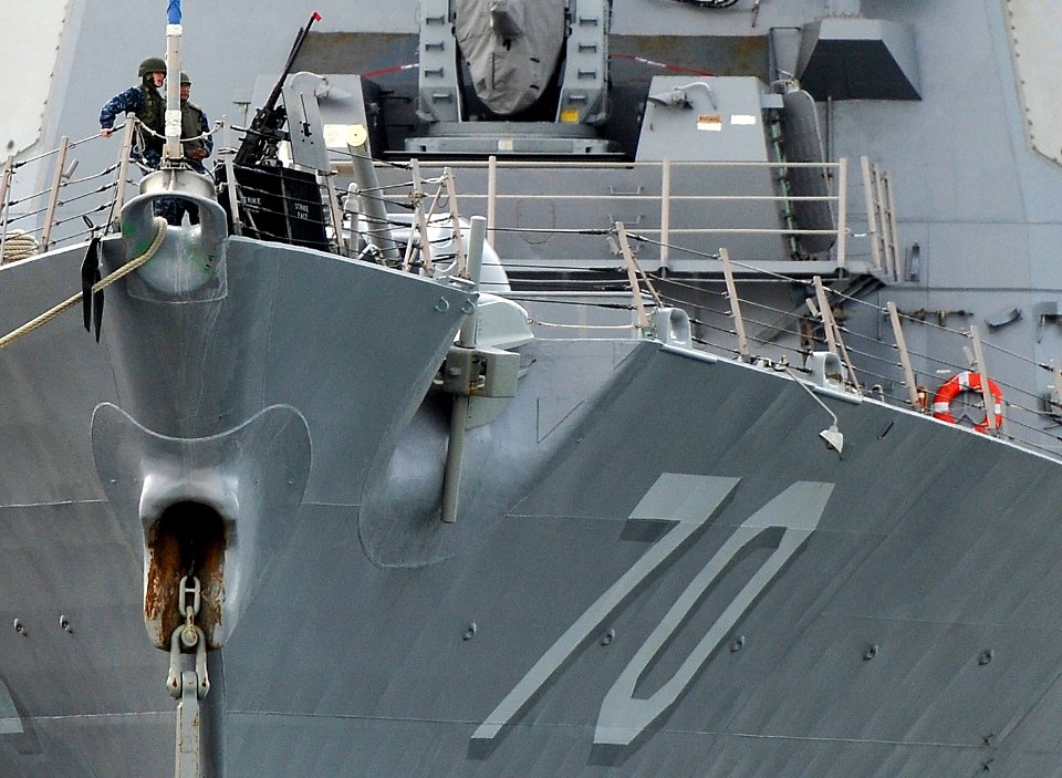 US Navy 110223-N-WP746-164 Sailors aboard the guided-missile destroyer USS Hopper (DDG 70) operate the forward gun mount during a Solid Curtain-Cit