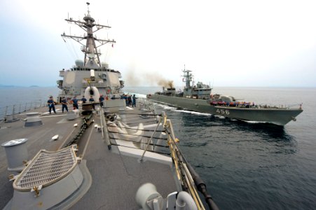US Navy 110221-N-0176M-001 The Royal Thai Navy frigate HTMS Bangpakong (FFG 456) is underway alongside the guided-missile destroyer USS Higgins (DD
