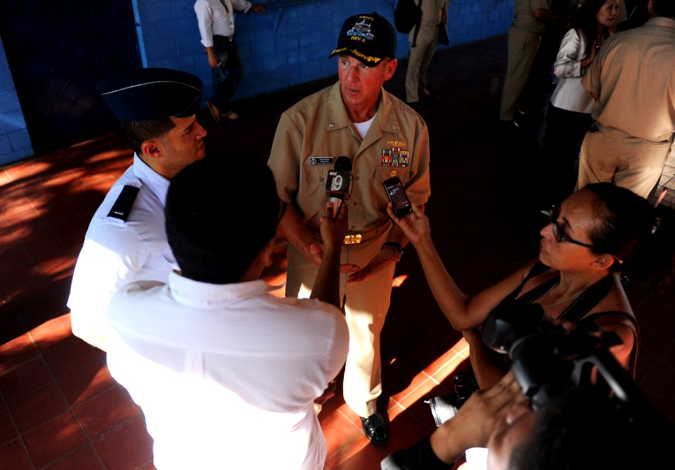 US Navy 110228-N-WX845-146 mdr. Mark Becker, mission commander of Southern Partnership Station 2011, speaks with members of the Salvadoran media af