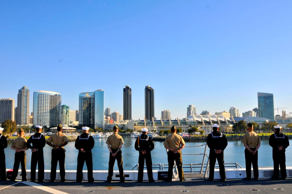 US Navy 110222-N-7042V-046 Sailors and Marines man the rails as the amphibious transport dock ship USS Green Bay (LPD 20) departs San Diego on its