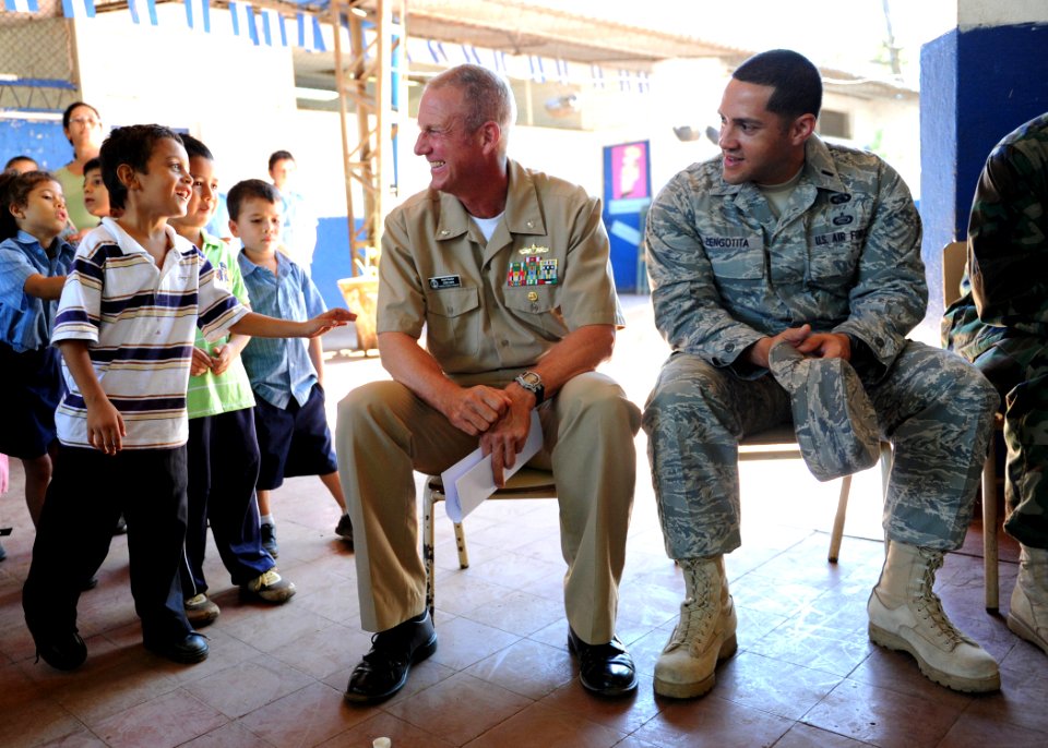US Navy 110225-N-EC642-048 Cmdr. Mark Becker, mission commander of Southern Partnership Station 2011, center, and Air Force 1st Lt. Axel Zengotita