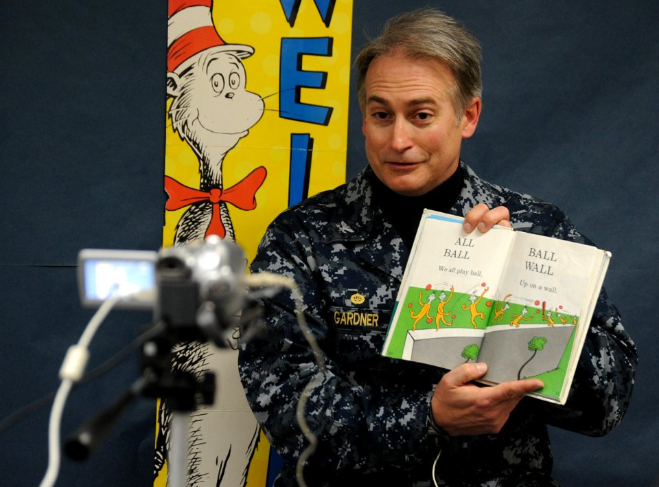 US Navy 110301-N-2858S-006 Capt. Eric Gardner, commanding officer of Naval Air Facility Atsugi, makes a recording of Dr. Seuss'