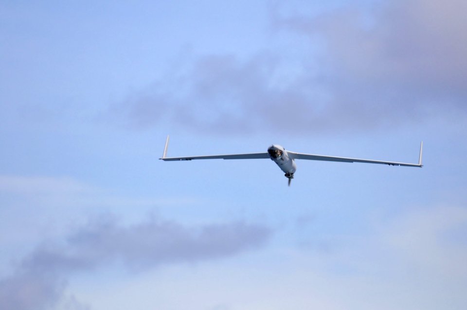 US Navy 110226-N-RC734-147 A Scan Eagle unmanned aerial vehicle in flight during launch and recovery exercises aboard the amphibious dock landing s