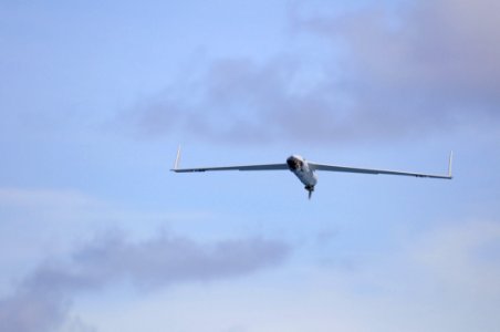 US Navy 110226-N-RC734-147 A Scan Eagle unmanned aerial vehicle in flight during launch and recovery exercises aboard the amphibious dock landing s