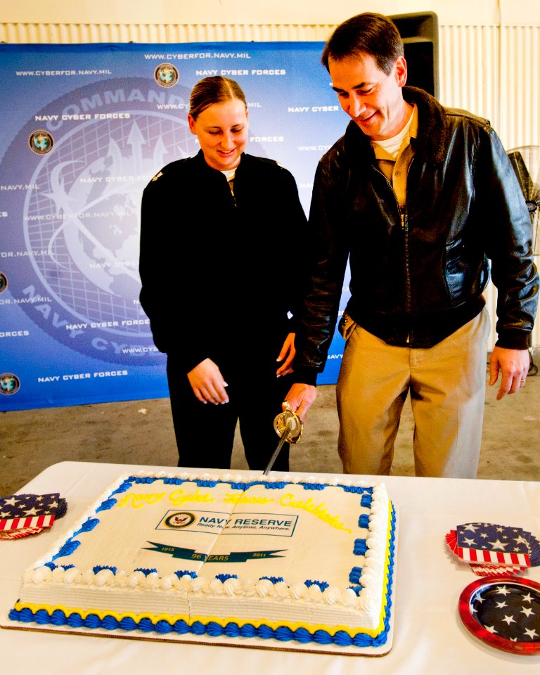 US Navy 110303-N-XS652-002 Capt. Doug Swanson, right, director of Global Network Operations at Naval Network Warfare Command (NETWARCOM)