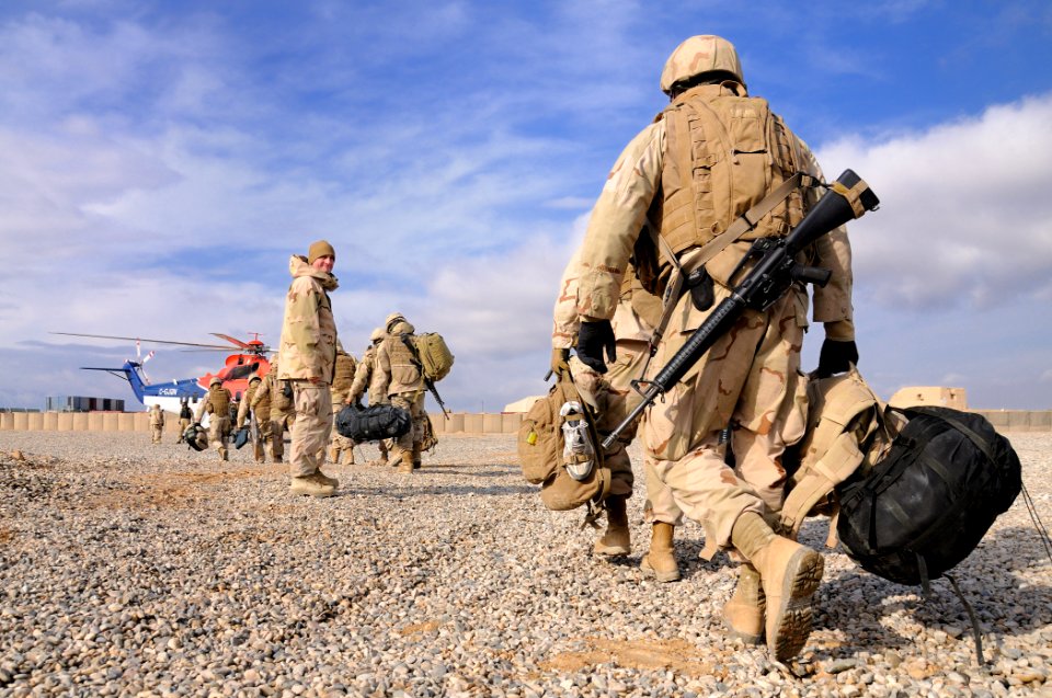 US Navy 110228-N-6436W-031 Seabees assigned to Naval Mobile Construction Battalion (NMCB) 40 begin their journey back to homeport in Port Hueneme,