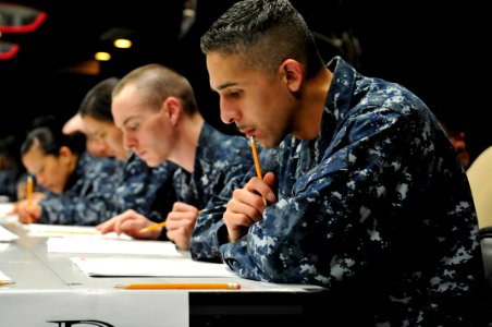 US Navy 110304-N-IO627-004 Yeoman 2nd Class Michael Davila takes the Navy-wide first class petty officer advancement examination