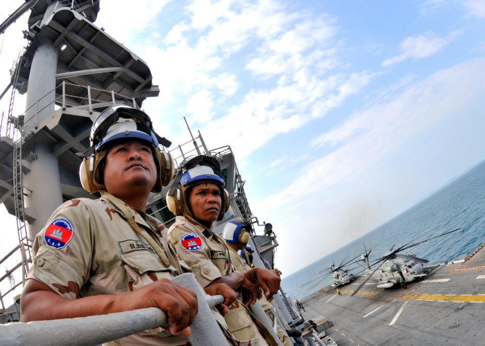 US Navy 110227-N-9950J-210 Royal Cambodian Navy officers observe flight quarters during a ship tour aboard the forward-deployed amphibious assault