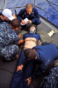US Navy 110304-N-ZS026-013 Sailors conduct medical triage training on a simulated patient aboard the amphibious assault ship USS Boxer (LHD 4)