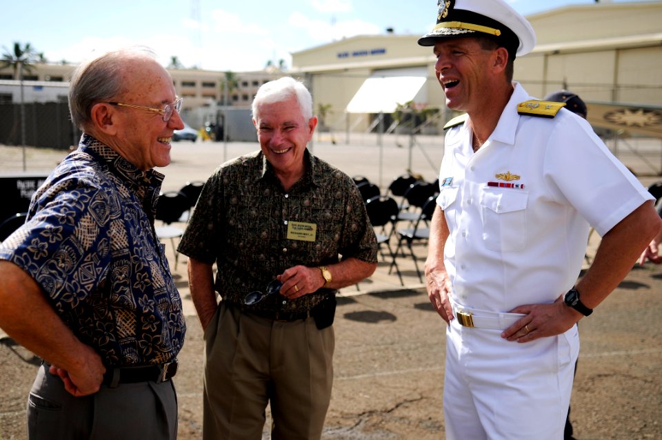 US Navy 110225-N-WP746-038 Retired Adm. Ronald Hays, left, Richard May Jr. and Rear Adm. Dixon Smith, commander of Navy Region Hawaii, share a laug