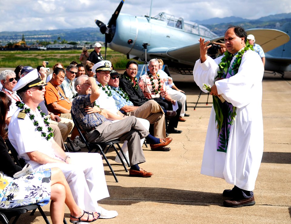 US Navy 110225-N-WP746-108 Kahu Kordell Kekoa explains the significance of the Hawaiian blessing during the Ford Island Control Tower blessing cere