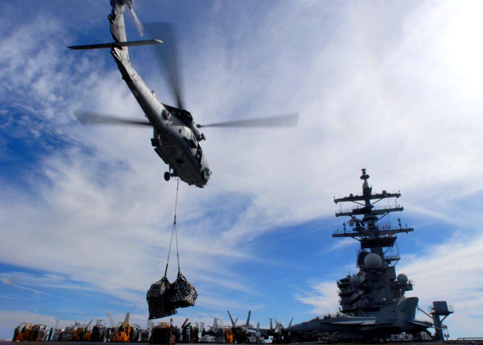 US Navy 110301-N-SB672-215 An HH-60H Sea Hawk helicopter assigned to the Black Knights of Helicopter Anti-Submarine Squadron (HS) 4 delivers cargo