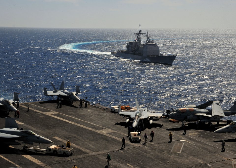 US Navy 110303-N-0074G-001 The Ticonderoga-class guided-missile cruiser USS Leyte Gulf (CG 55) pulls alongside the aircraft carrier USS Enterprise