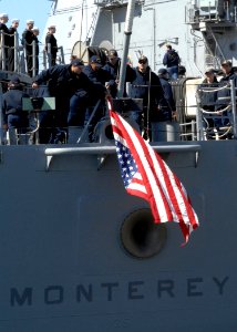 US Navy 110307-N-5292M-058 Sailors man the rails as the guided-missile cruiser USS Monterey (CG 61) prepares to depart Naval Station Norfolk for a