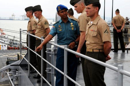 US Navy 110303-N-6692A-064 Capt. Aang Iskandar talks to Marines during the arrival of USS Germantown (LSD 42)