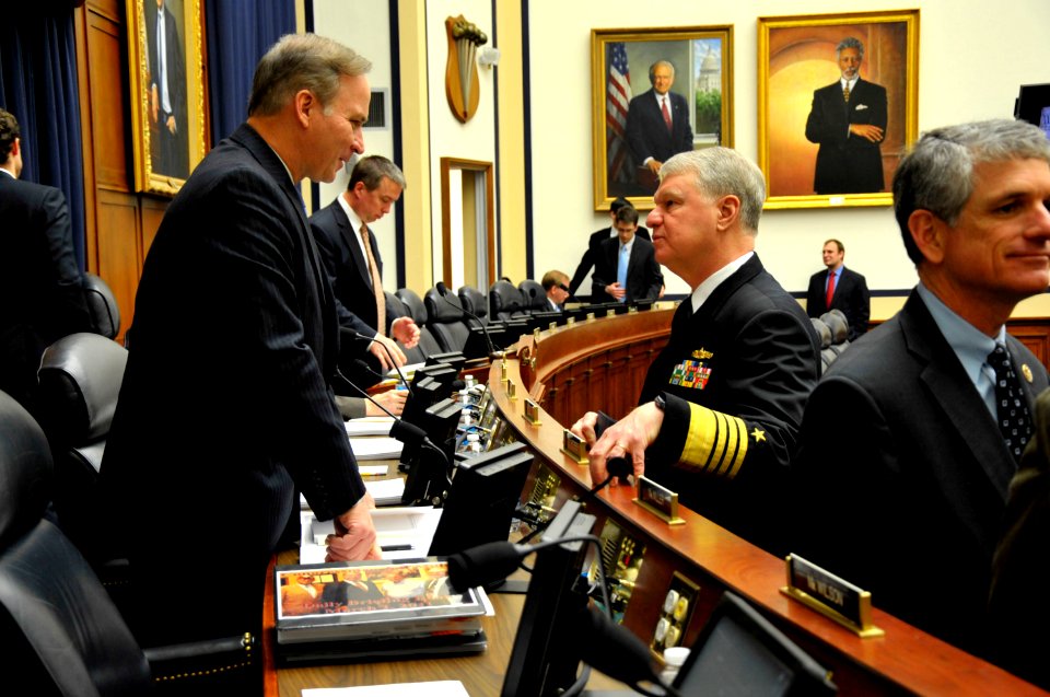 US Navy 110301-N-ZB612-007 Chief of Naval Operations (CNO) Adm. Gary Roughead speaks with Rep. Randy Forbes before testifying before the House Arme