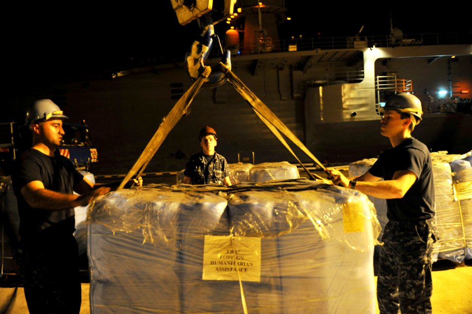 US Navy 110311-N-0864H-820 USS Blue Ridge (LCC 19) on-load humanitarian assistance supplies in Singapore to ensure the ship and crew are ready to s