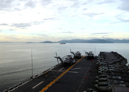 US Navy 110312-N-5538K-059 The forward-deployed amphibious assault ship USS Essex (LHD 2) gets underway from Sepangar, Malaysia to support earthqua