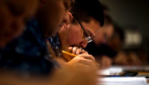 US Navy 110303-N-2055M-148 Sailors participate in the E-6 advancement exam aboard USS Carl Vinson (CVN 70)