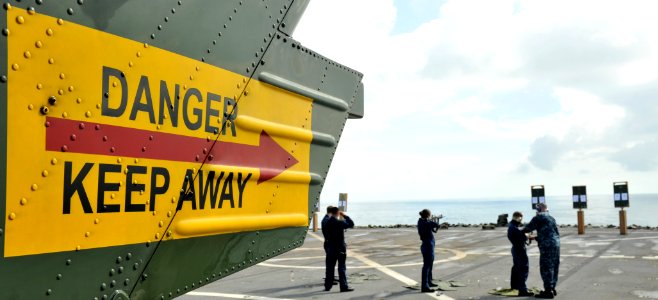 US Navy 110304-N-0864H-849 Sailors participate in an M-16 rifle qualification aboard the U.S. 7th Fleet command ship USS Blue Ridge (LCC 19)