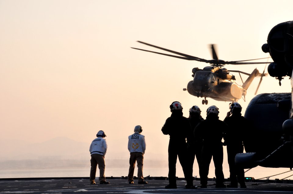 US Navy 110312-N-3999C-233 An MH-53E Sea Dragon helicopter assigned to Mine Countermeasures Squadron (HM) 14 lands aboard the amphibious dock landi