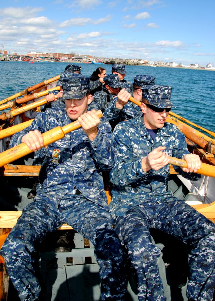 US Navy 110312-N-7642M-451 The gig crew, comprised of Sailors assigned to USS Constitution, pulls hard as they struggle to the finish line during