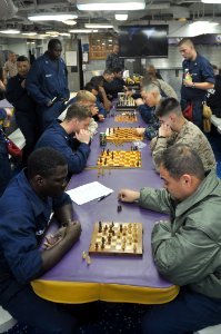 US Navy 110311-N-7293M-186 Sailors and Marines aboard the amphibious transport dock ship USS Ponce (LPD 15) compete in a chess tournament sponsored