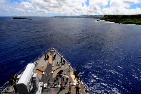 US Navy 110312-N-RC734-080 The amphibious dock landing ship USS Comstock (LSD 45) approaches Apra Harbor, Guam for a port visit to Naval Base Guam
