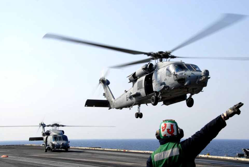 US Navy 110313-N-KF029-019 An HH-60H Sea Hawk helicopter assigned to the Black Knights of Helicopter Anti-Submarine Squadron (HS) 4 launches from t