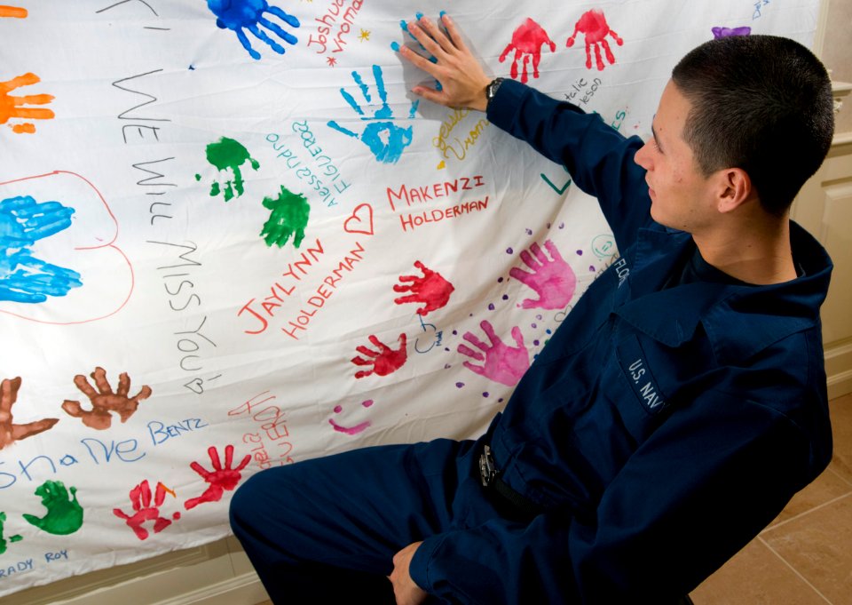 US Navy 110314-N-7488A-026 Aviation Ordnanceman Airman Salvador Flores, assigned to the weapons department of the Nimitz-class aircraft carrier USS