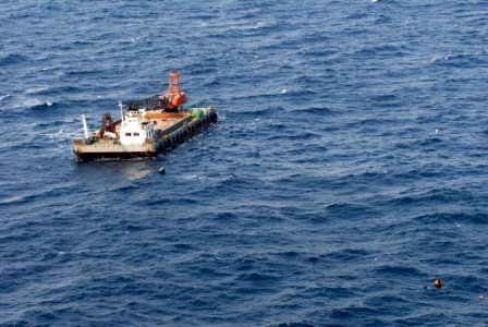 US Navy 110313-N-SB672-523 A Japanese barge is seen adrift in the Pacific Ocean. Ships and aircraft from the Ronald Reagan Carrier Strike Group are