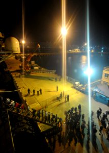 US Navy 110311-N-4743B-473 Sailors assigned to the amphibious assault ship USS Essex (LHD 2) and Marines from the 31st Marine Expeditionary Unit (3
