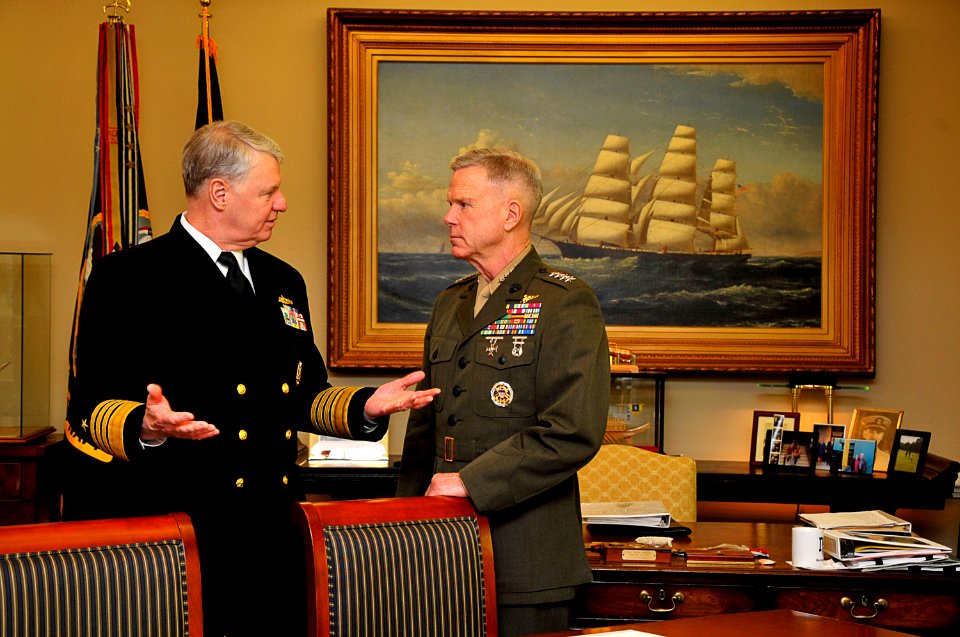 US Navy 110314-N-ZB612-010 Adm. Gary Roughead and Gen. James F. Amos speak prior to signing a Memorandum of Understanding on Tactical Aviation Inte