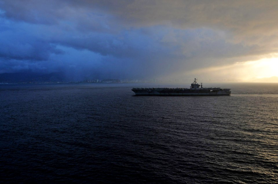 US Navy 110310-N-PM781-065 The aircraft carrier USS Abraham Lincoln (CVN 72) arrives in Pearl Harbor for a port visit