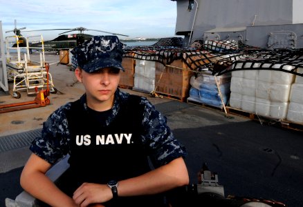 US Navy 110312-N-5716H-280 Information Systems Technician 3rd Class Jenna Welsh stands watch during sea and anchor detail as the U.S. 7th Fleet com