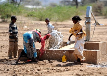 US Navy 110311-N-SN160-227 Ethiopian children play in the water of a well built by Seabees assigned to Naval Mobile Construction Battalion (NMCB) 7