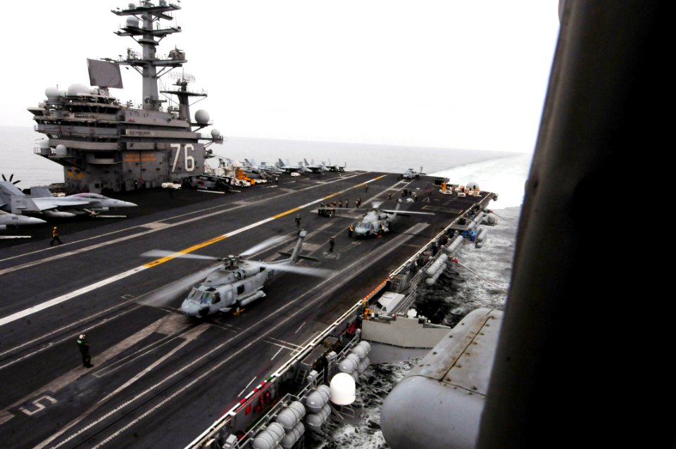 US Navy 110315-N-5503T-577 HH-60H Sea Hawk helicopters from the Black Knights of Helicopter Anti-Submarine Squadron (HS) 4 prepare to lift off afte